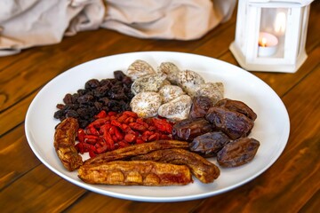 Group of dehydrated dried fruits, dates, goji berries, raisins, dried bananas and Turkish figs. Superfood