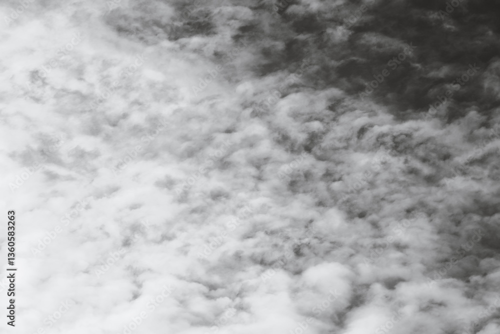 Poster Aerial view of a plane flying high up in the clouds.