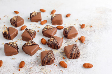 Handmade chocolate with pistachios, dark and milk chocolate pieces.