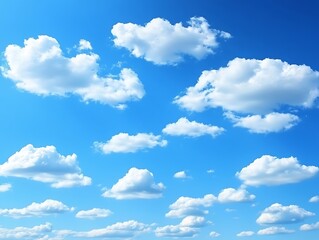 Fototapeta premium Beautiful bright blue sky filled with fluffy white clouds