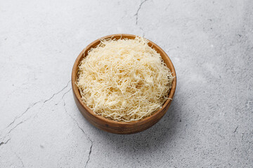 Homemade uncooked kataifi or kadaifi dough.