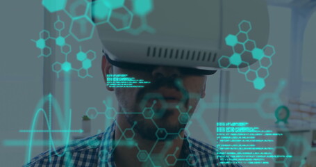Man using virtual reality headset with digital interface overlay in modern office