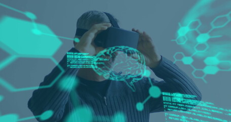 Man using VR headset exploring digital interface with futuristic graphics overlay