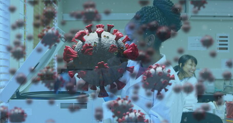 Scientists in laboratory researching virus, focusing on innovative medical solutions