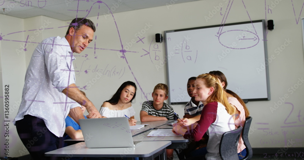 Poster teacher explaining math concepts to attentive students in classroom, using laptop