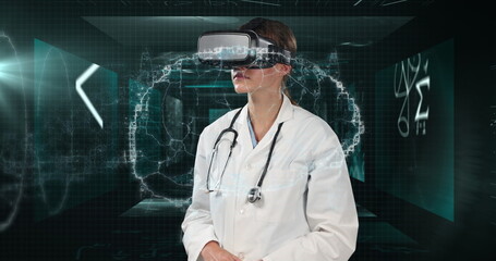 Image of female doctor wearing virtual reality headset viewing brain and medical data processing