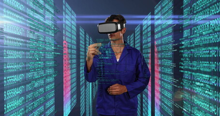 Image of man in overalls and virtual reality headset swiping virtual touchscreen in server room