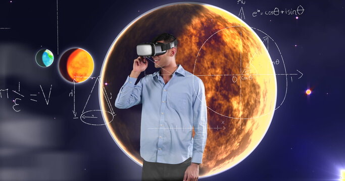 Man using VR headset exploring virtual planets and mathematical equations