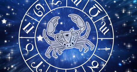 Image of cancer star sign symbol in spinning horoscope wheel over glowing stars