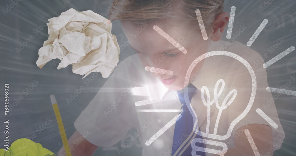 Poster image of lit light bulb over schoolboy writing in class in background