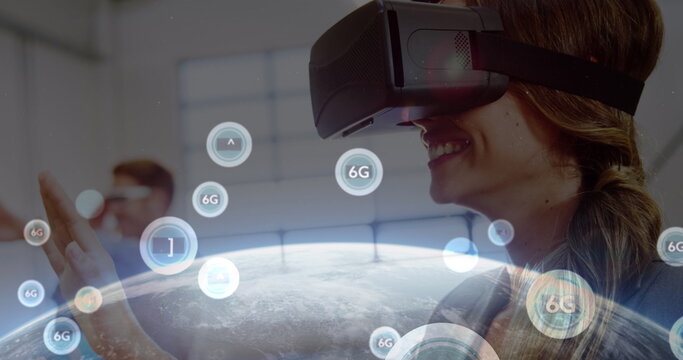 Image of 6g text, scopes scanning and data processing over woman wearing vr headset - Powered by Adobe
