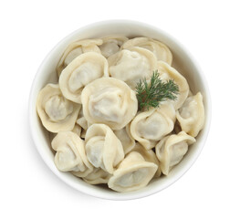 Tasty dumplings and dill in bowl isolated on white, top view