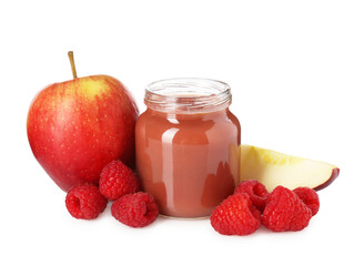 Baby food. Tasty puree in glass jar, fresh apples and raspberries isolated on white