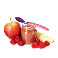 Baby food. Tasty puree in glass jar, fresh apples, raspberries and spoon isolated on white