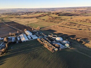 Aerial view of BIOGAS POWERPLANT producing renewable energy from organic waste and agricultural...