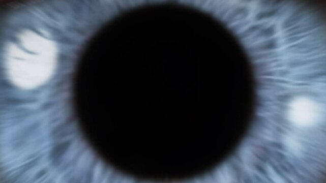 Extreme Close-Up Of A Blue Eye Blinking Slowly, Transitioning Into A Deep Black Void. Visual Metaphor Of Consciousness, Perception, And Infinity.
