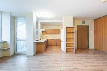 Modern Home Open Space Room With Hardwood Flooring and Compact Kitchen Design
