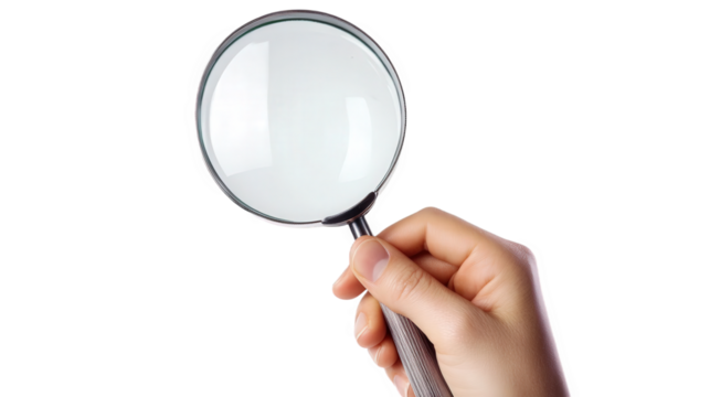 hand holding magnifying glass