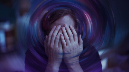 Person's hands covering face, purple swirling background suggesting anxiety or distress, symbolic of mental health challenges