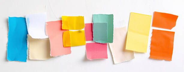 Colorful vibrant array of square sticky notes, textured paper squares for office, with empty space for text, subtle grain