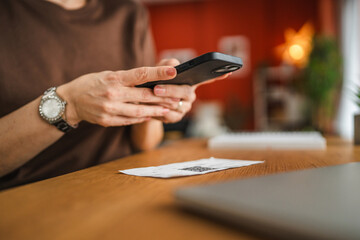 woman have contactless payment and pay bills while work from home