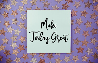 Make Today Great text  motivational and inspiration quote on paper card with star glitter decoration flat lay on purple background