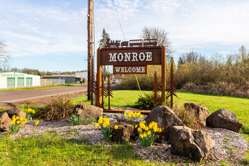 Monroe Welcome sign on the highway