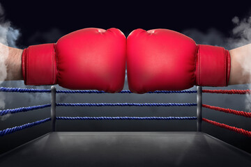 Boxers fighting surrounded by smoke in boxing ring, closeup