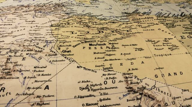 Libya Old map paper vintage Africa Europe Turkey Mediterranean Sea Camera travels above an old paper vintage map of Africa