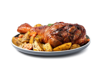 Baked turkey drumstick and vegetables isolated on white