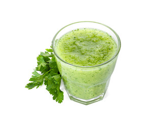 Healthy parsley smoothie in glass and leaves isolated on white