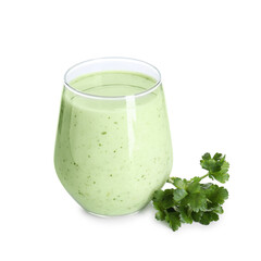 Healthy parsley drink in glass and leaves isolated on white