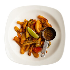 Vegetable tempura with soy and lime closeup. Japanese cuisine. Isolated over white background