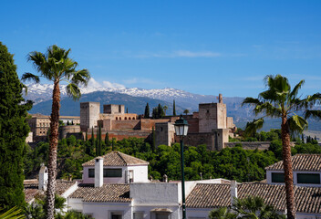 Scenic View of the Historic Alhambra Palace and Fortress Complex with Snow-Capped Sierra Nevada Mountains in the Background, Granada, Andalusia, Spain