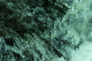 Waterfall motion nearly stopped by high speed flash, New Hampshire.