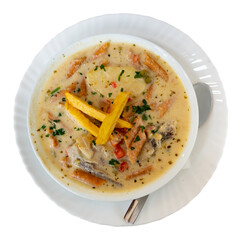 Sopa de mani is peanut soup made with beef, beef bones, potatoes and peas as the main ingredients. Latin American cuisine. Isolated over white background