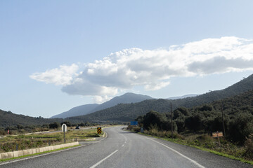 A stunning photograph of a scenic road winding through the breathtaking landscapes of Turkey. 