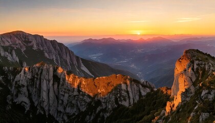 Mountain ranges and hills of forests and lakes during golden hour and a bright sky