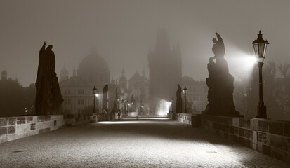 Prague - Charles bridge in the morning fog