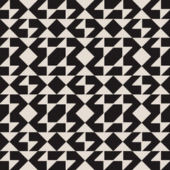 Fototapeta premium Seamless geometric half square triangle pattern in black and white. Graphical illustration for a unique wall decor, textiles and interior design.