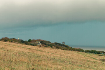 View of heavy clouds from a cliff