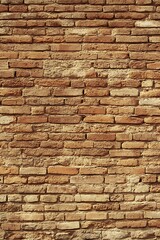 Obraz premium Distressed Brickwork Surface displaying Weathered Textures and Patterns