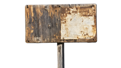 a weathered wooden sign on a post showing signs of age and negle