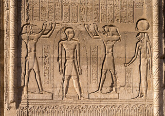 Bas-relief carvings of gods and kings on the well-preserved facade of the Temple of Esna with carvings
