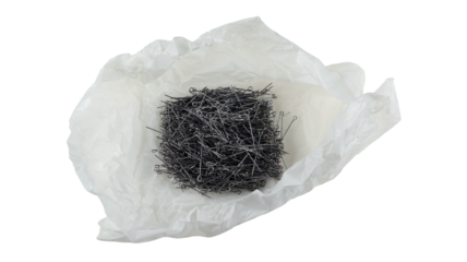 Metal sewing pins with rings are neatly packed in parchment paper, ideal for maintaining organization during sewing projects. Perfect for any crafting enthusiast.