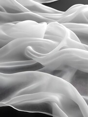 Obraz premium White flowing fabric with delicate folds and soft textures