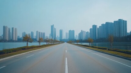 Obraz premium Empty Road Leading to Cityscape, Urban Landscape, Calm Morning