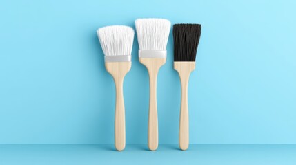 Three Different Paint Brushes on a Bright Blue Background for Home Improvement and DIY Projects