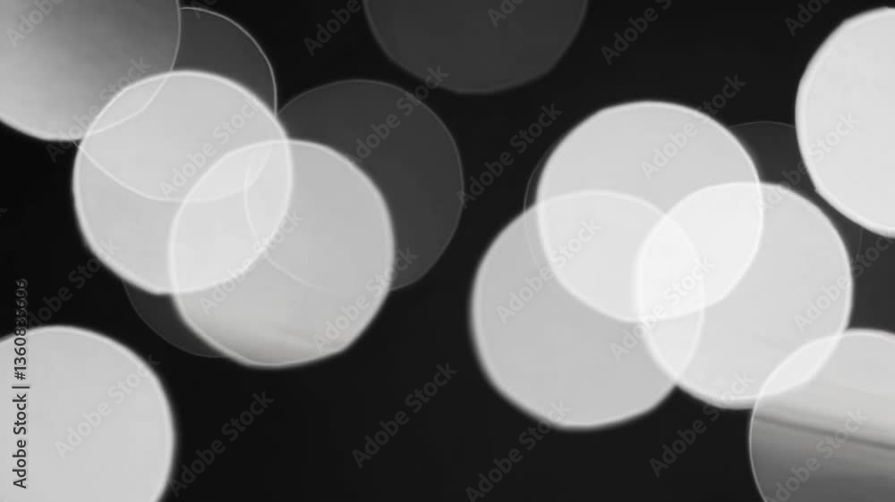 Aufkleber abstract video concept with a bokeh effect in black and white. overhead camera angle captures blurre