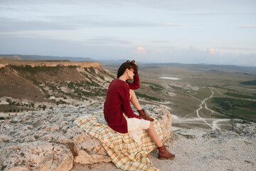 Woman contemplating the majestic beauty of nature a serene moment of travel and reflection on the...